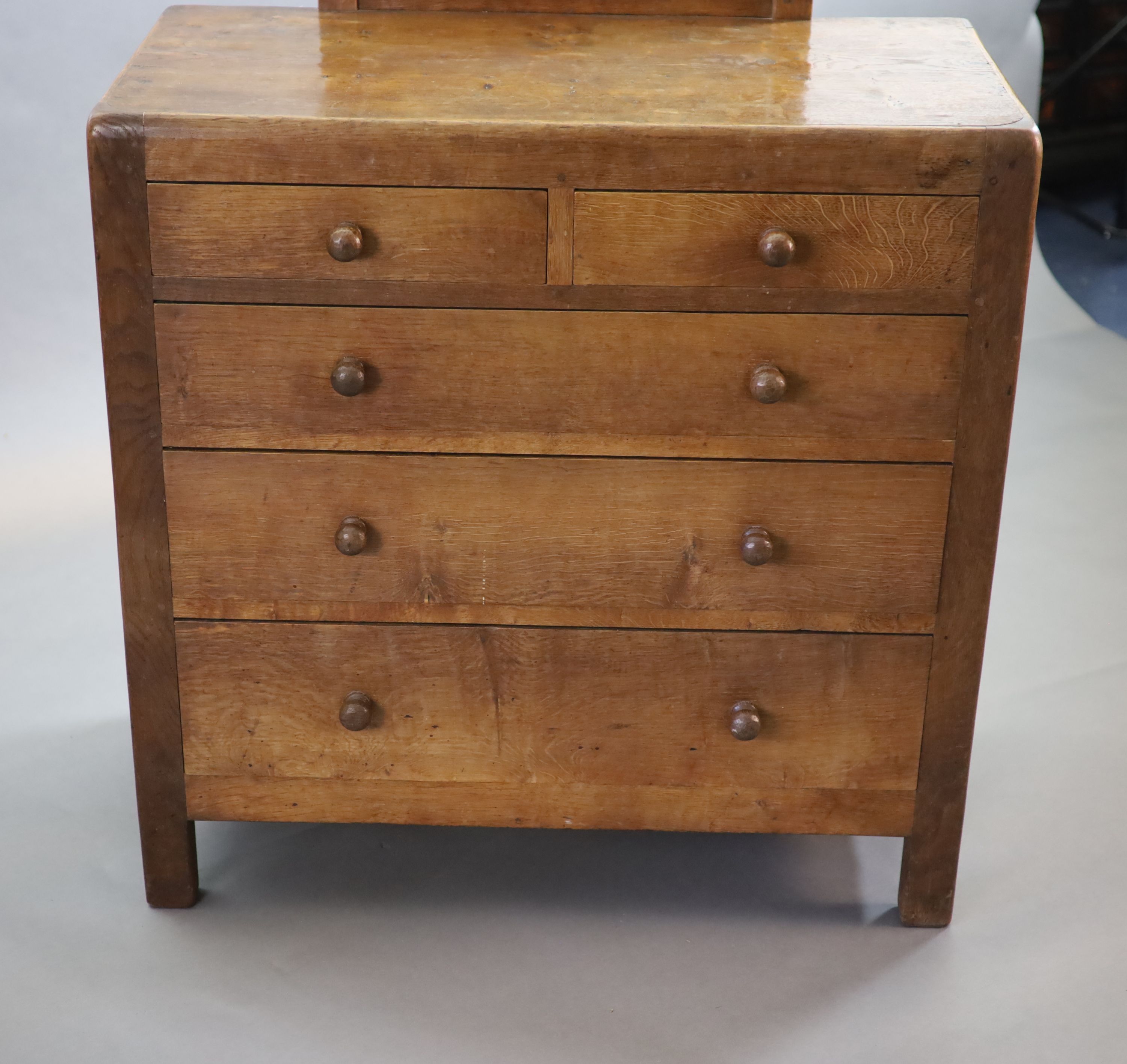 A Robert Thompson Mouseman oak dressing chest, W.91cm D.46cm H.152cm